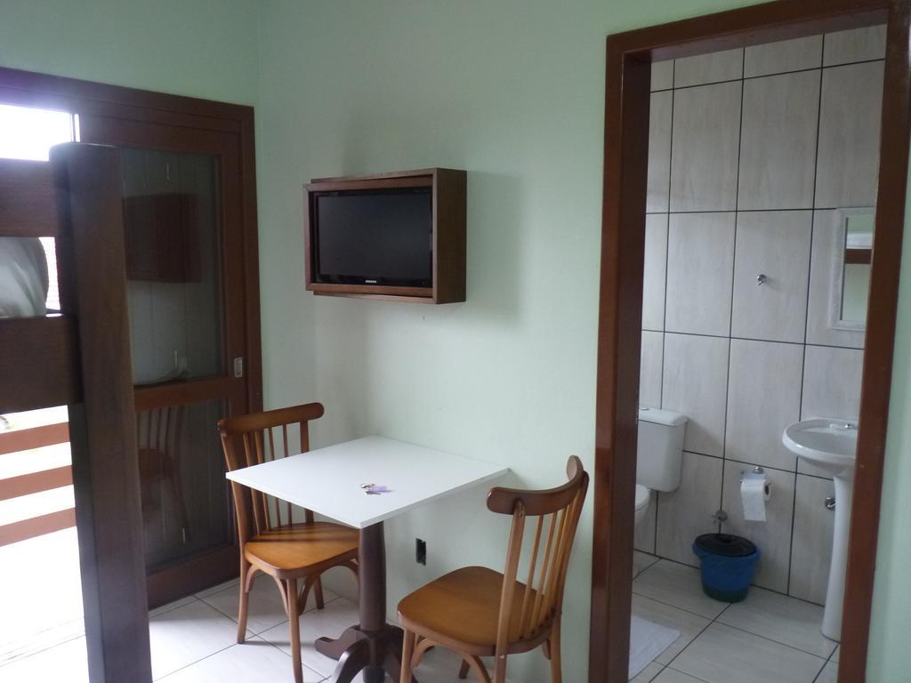Hotel Girassol Imbé Quarto foto
